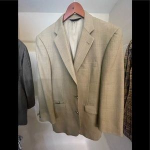 Burberry Blazer. Never worn. It would fit a person 5’9”-6’1”